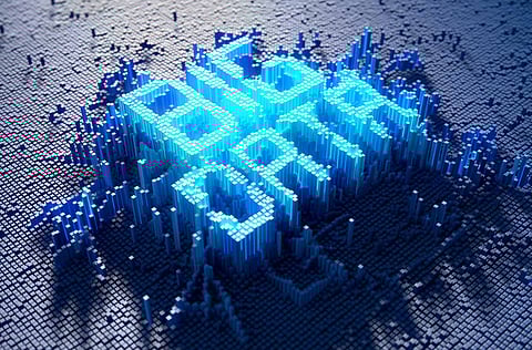 A 3D render of a microscopic closeup concept of small cubes in a random layout that build up to form the word BIG DATA illuminated