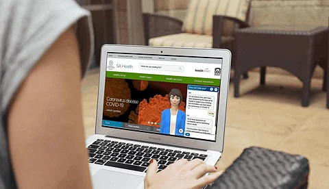 AI-Enabled VideoBot Answers COVID-19 Queries with Multilingual Voice and Text