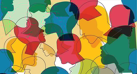 Seamless pattern of a crowd of many different people profile heads. Vector background.