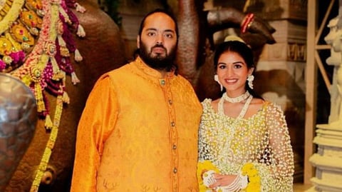 ஆனந்த் - ராதிகா தம்பதி