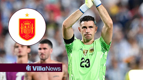 Emi Martinez of Aston Villa in action for Argentina, Spain badge in inset