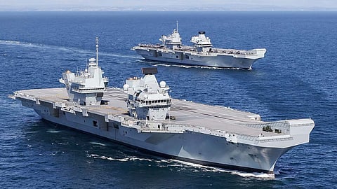 The Royal Navy aircraft carriers HMS Prince of Wales and HMS Queen Elizabeth pictured at sea for the first time, May 19, 2021