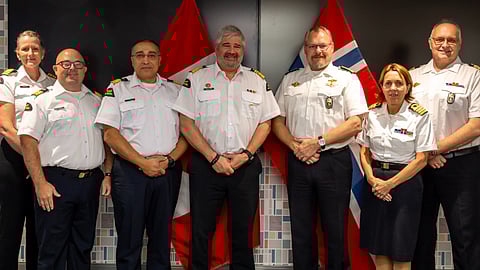 Canadian Coast Guard Commissioner Mario Pelletier (fourth from left) and Norwegian Coast Guard Commander Commodore Øyvind Dunsæd (fifth from left) together with other officers at the signing of a new letter of intent for further cooperation between the two services, September 13, 2024