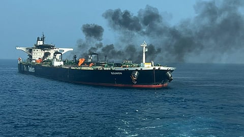 Smoke and flames continue to billow from the Greek-operated crude oil tanker Sounion after it has been taken under tow in the Red Sea, September 14, 2024. The ship suffered damage following a series of attacks by Yemen's Houthi rebels beginning on August 21.