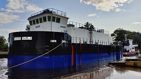 Mowi Scotland's new feed barge being launched into the water at Nauplius Workboats' facilities in the Netherlands