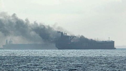 The São Tomé and Principe-flagged tanker Ceres I engulfed in thick black smoke following a collision with the Singapore-registered tanker Hafnia Nile off the eastern coast of Singapore, July 19, 2024