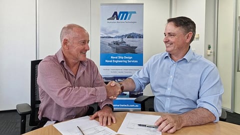 AMT Managing Director Rob Dunbar (left) and BMT Regional Business Director APAC Graeme Nayler at the signing of the acquisition agreement, December 2, 2024