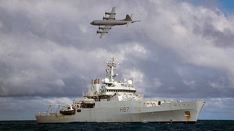 A Royal Australian Air Force AP-3C Orion maritime patrol aircraft and the Royal Navy survey vessel HMS Echo somewhere in the Indian Ocean during the search for the missing Malaysia Airlines Flight 370, April 12, 2014 (Photo: UK Ministry of Defence/LS(HM) Andy Coutanche)