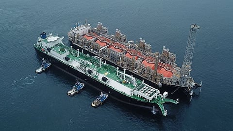 A Golar LNG floating processing vessel (right)