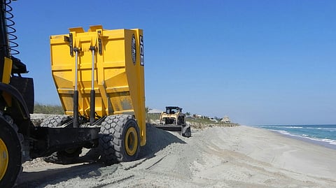 A photo taken during Sebastian Inlet District's 2023 Truck Sand Haul Project