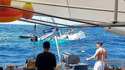 The tour boat Ameray 888 partially submerged off Phuket