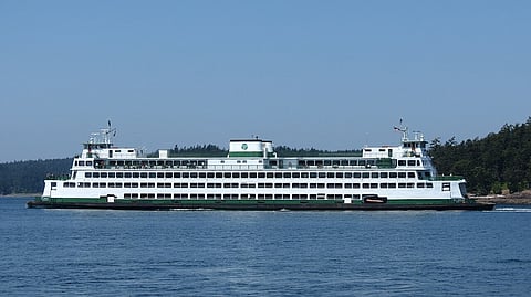The Washington State ferry Elwha passes Flat Point on Lopez Island