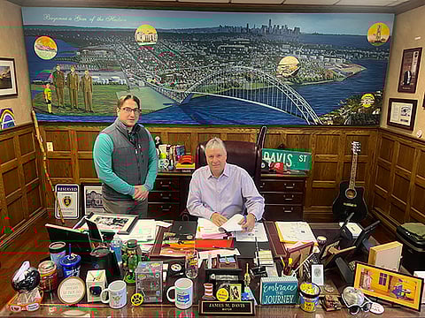 Bayonne Mayor signs purchase and sale agreement for buying back a parcel of land from the Port Authority for a ferry terminal