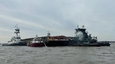 The US Coast Guard and partner agencies responding to a tug fire that occurred near Pea Patch Island on the Delaware River, February 18, 2025.