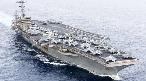 The US Navy Nimitz-class aircraft carrier USS Harry S. Truman transits the Strait of Gibraltar, November 25, 2024.