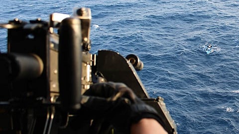 Warning shots are fired from the NH90 maritime combat helicopter