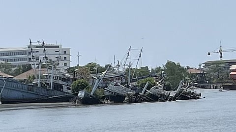 The Mahachai fishing fleet lays sunk and rotting