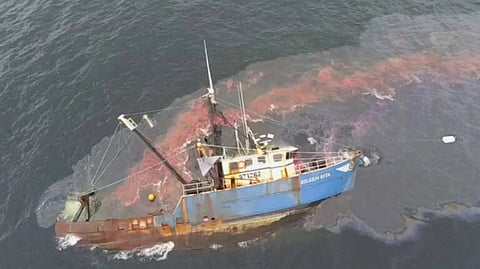 Three rescued from grounded fishing vessel near Green Island, Massachusetts