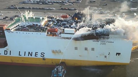 The firefighting effort on the Con-Ro vessel Grande Costa D’Avorio at Port Newark in New Jersey, July 5, 2023. Two land-based firefighters died while responding to the incident.