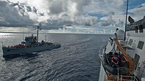 The Philippine Navy patrol ship BRP Miguel Malvar steams alongside the US Coast Guard national security cutter USCGC Waesche during a replenishment at sea approach training event in the Celebes Sea as part of the CARAT bilateral military exercise, July 7, 2012.