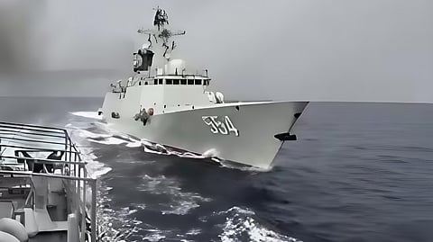 Jiangkai II-class frigate with bow number 554 sails dangerously close to BRP Emilio Jacinto