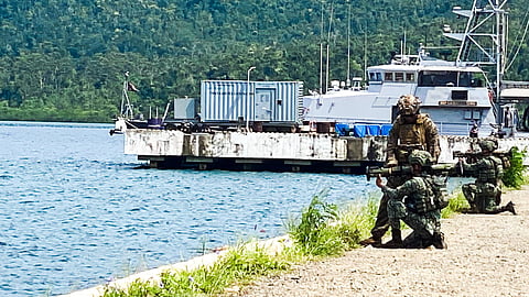 US and Philippine Marine Corps personnel conduct a live-fire exercise at Naval Detachment Oyster Bay, Palawan, Philippines, October 17, 2024. In the background is the Philippine Navy patrol ship BRP Ladislao Diwa (ex-USS Chinook).