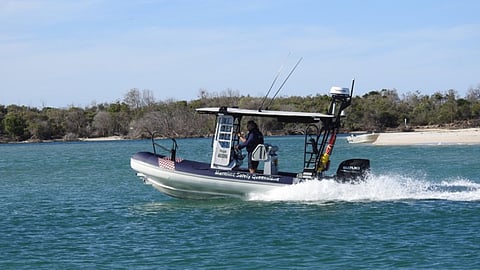 Boat on patrol in Pumicestone Passage