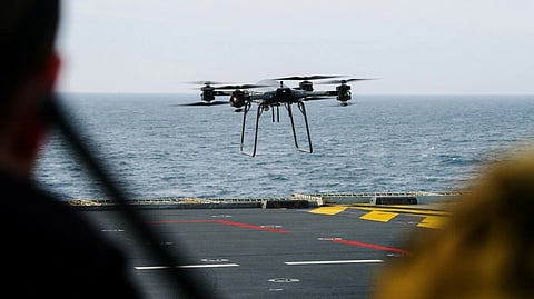 Malloy T-150 drone transports supplies between UK Carrier Strike Group ships