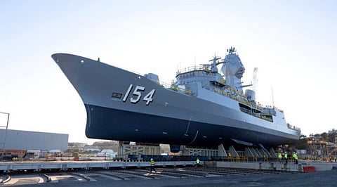 HMAS Parramatta is moved towards the lift during the ship's undocking at the BAE Systems shipyard in Henderson, Western Australia.