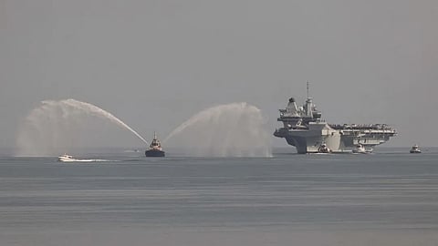 HMS Prince of Wales greeted by a water cannon upon arrival into Darwin, Australia