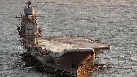 The Russian Navy aircraft carrier Admiral Kuznetsov being escorted by the Royal Navy Type 42 destroyer HMS York in international waters off the UK on December 12, 2011