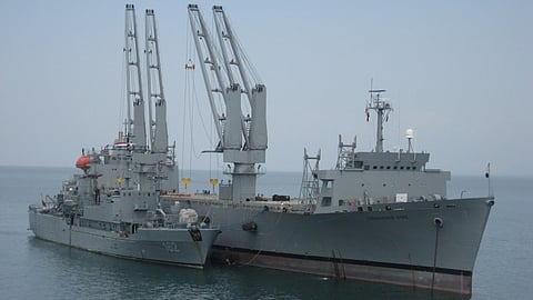 Cornhusker State (right), an auxiliary crane ship of the US Ready Reserve Force