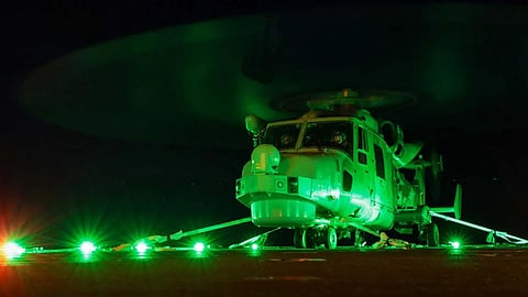Wildcat attack helicopter on the flight deck of the Royal Navy River-class patrol vessel HMS Trent during workups prior to deploying to the Caribbean