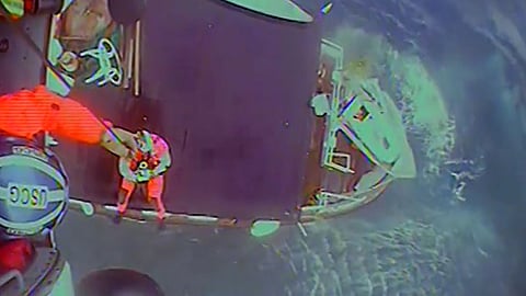 A US Coast Guard MH-60 Jayhawk helicopter aircrew from Coast Guard Air Station Kodiak, Alaska, rescues four people from the tug Sea Ranger, which was taking on water approximately 130 miles south of Cordova, August 1, 2025. All four crewmembers were hoisted off the vessel and taken to awaiting emergency medical services in Cordova where no injuries were reported.