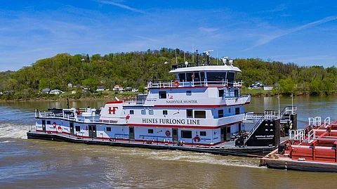 The towboat Donna H Furlong helped extinguish the blaze on the barge