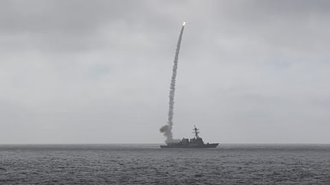 The US Navy Arleigh Burke-class guided-missile destroyer USS Michael Murphy fires an SM-2 Block III missile during a live-fire exercise.