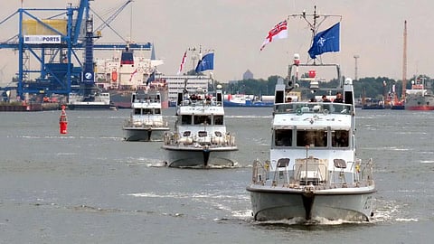 The Archer-class patrol vessel HMS Pursuer leads two of her sisters out of Hamburg.