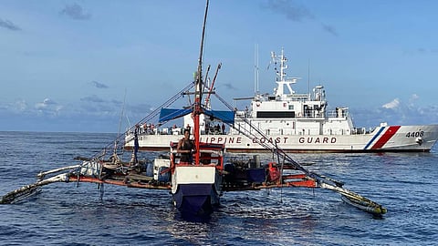 The fishing boat Saider with the Philippine Coast Guard multi-role response vessel BRP Cape San Agustin in the background, August 22, 2025