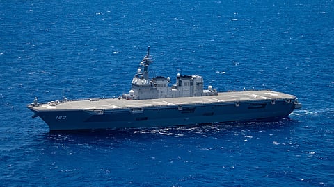 The Japan Maritime Self-Defence Force destroyer helicopter ship JS Ise participates in a group sail during the Rim of the Pacific exercise off the coast of Hawaii, July 26, 2018.