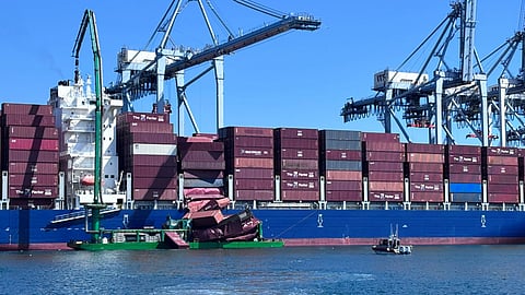 The containership Mississippi, an emissions capture barge alongside, and some of the collapsed containers at the Port of Long Beach Pier G, September 9, 2025
