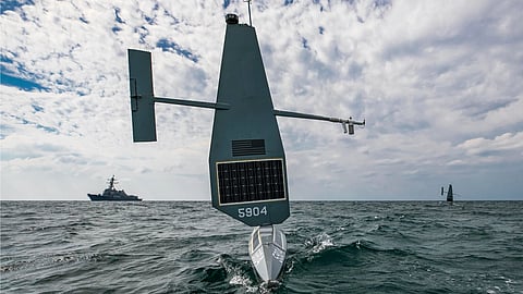 Two Saildrone unmanned surface vessels and the US Navy guided-missile destroyer USS Delbert D. Black