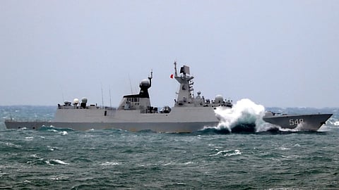 The Type 054A guided-missile frigate Yiyang (Hull 548) attached to a destroyer flotilla with the East China Sea Fleet under the PLA Navy steams in waters of the East China Sea during a maritime live-fire training exercise on January 26, 2018