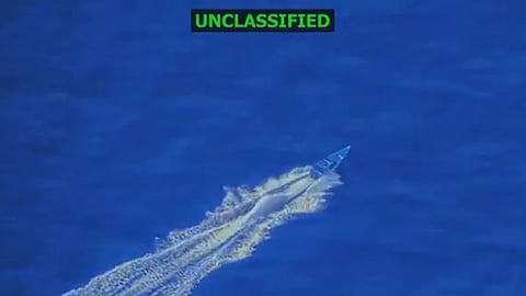 Screengrab of video showing drug trafficking vessel before being struck by US forces off Venezuela