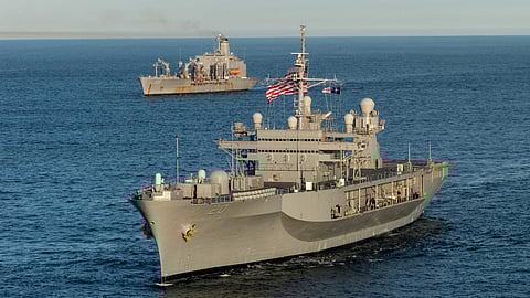 The US Navy amphibious command ship USS Mount Whitney (foreground) underway in the Baltic Sea during NATO's Exercise Trident Juncture 2018