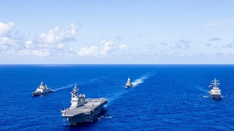 From left, the Indian Navy’s INS Sahyadri, the Japan Maritime Self-Defense Force’s JS Hyuga, the Royal Australian Navy’s HMAS Ballarat and the United States Navy’s USS Fitzgerald sail in company off the coast of Guam during Exercise Malabar.