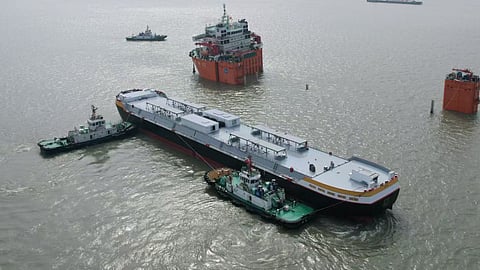 Somtrans' new bunkering barge United LNG I being loaded onto a heavy lift ship for transport from China to the Netherlands