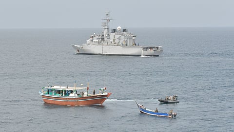 A French Navy frigate and a dhow during Combined Task Force 150's counter-drug operations in the Arabian Sea in late 2025