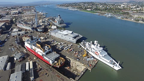 The US Coast Guard icebreaker USCGC Healy along with the US Navy ships USS Emory S. Land, USNS Henry J. Kaiser, USNS City of Bismarck, and USNS Pathfinder at Mare Island Dry Dock