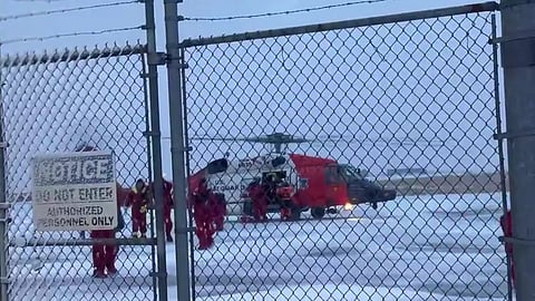 A US Coast Guard MH-60 Jayhawk helicopter aircrew from Forward Operating Site Cold Bay transports 9 crewmembers from a grounded commercial fishing vessel near St. George, Alaska, Jan. 5, 2026.