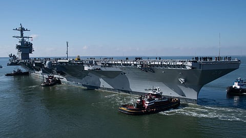 The US Navy Gerald R. Ford-class nuclear-powered aircraft carrier USS John F. Kennedy departs Newport News Shipbuilding's Virginia facilities for her initial sea trials, January 29, 2026.